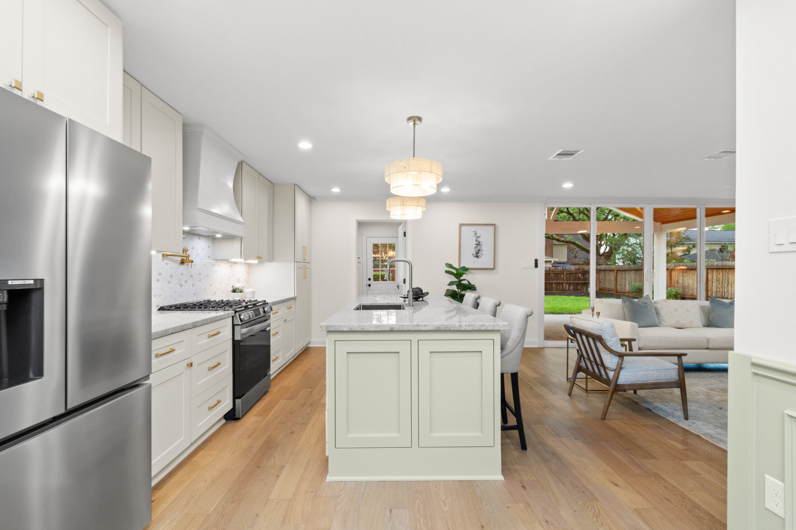 Quartz countertops and island by Vega Flooring, Houston TX