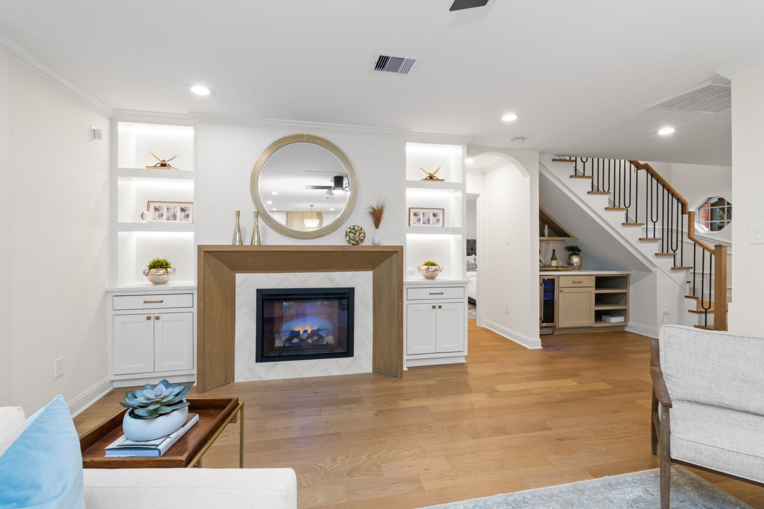 Whole home remodel living room and fireplace by Vega Flooring, Houston TX