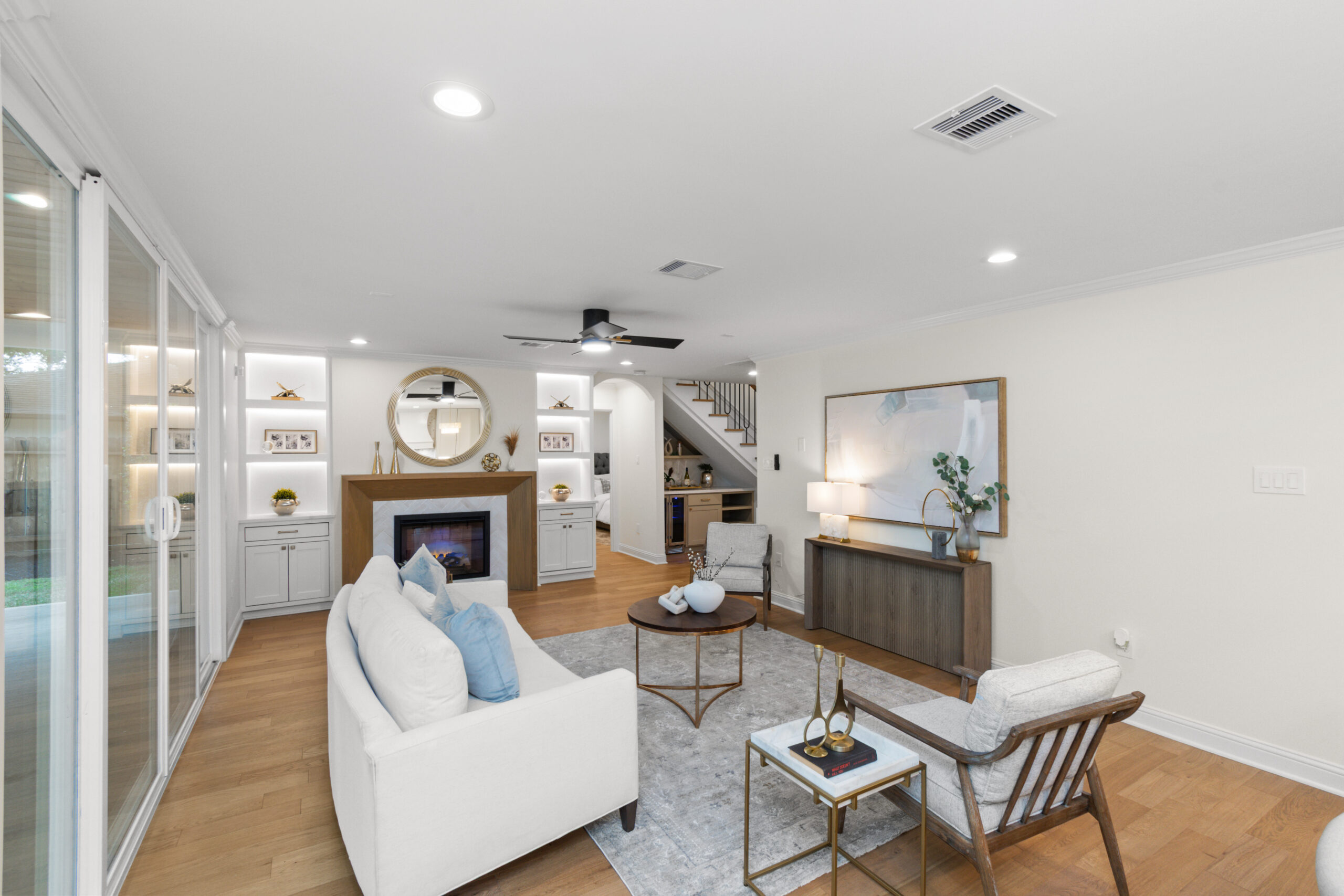 Professional flooring installation, living room with fireplace — Vega Flooring, Houston TX