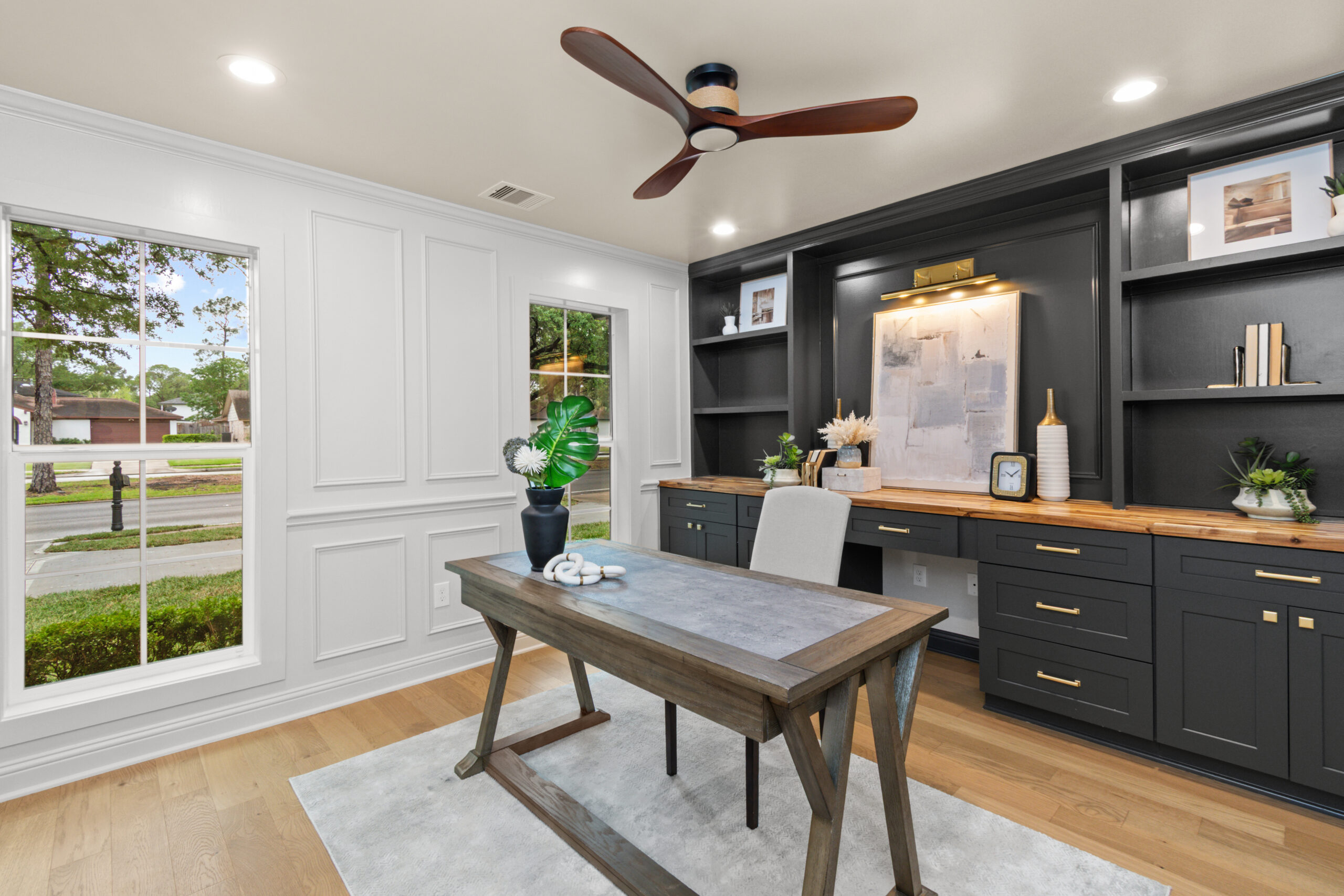Refinished hardwood floors in a Houston home office by Vega Flooring